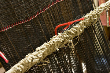 Weaving on Warp Weighted Loom